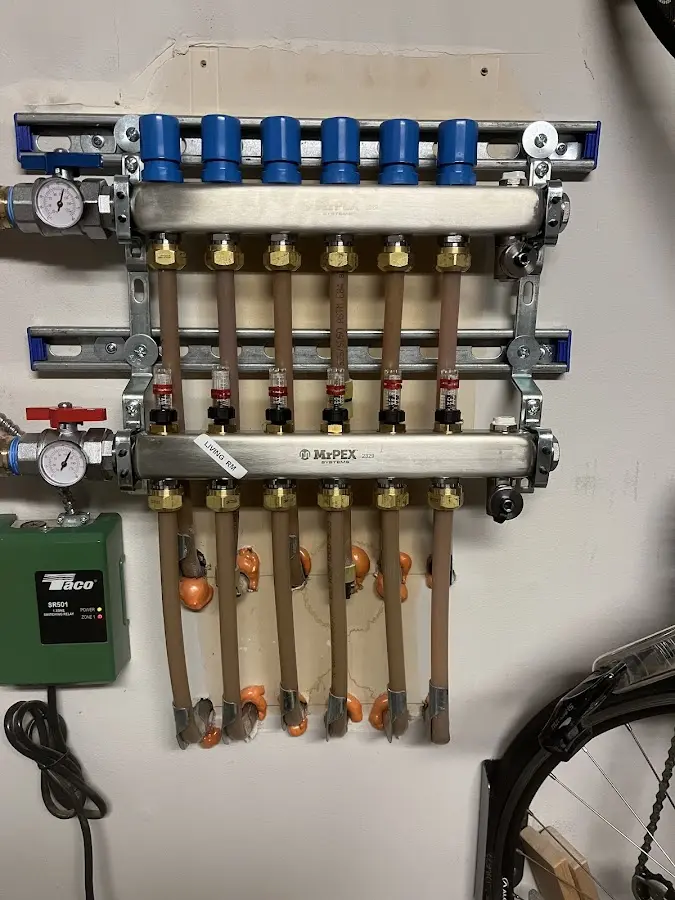 Plumber performing Leak Detection at a residential property in New Square